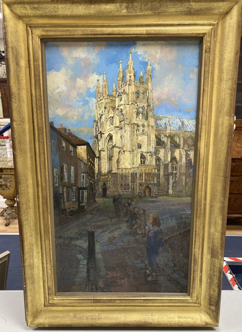 § Peter Kuhfeld (b.1952), oil on board, Children before Canterbury cathedral, 66 x 36cm